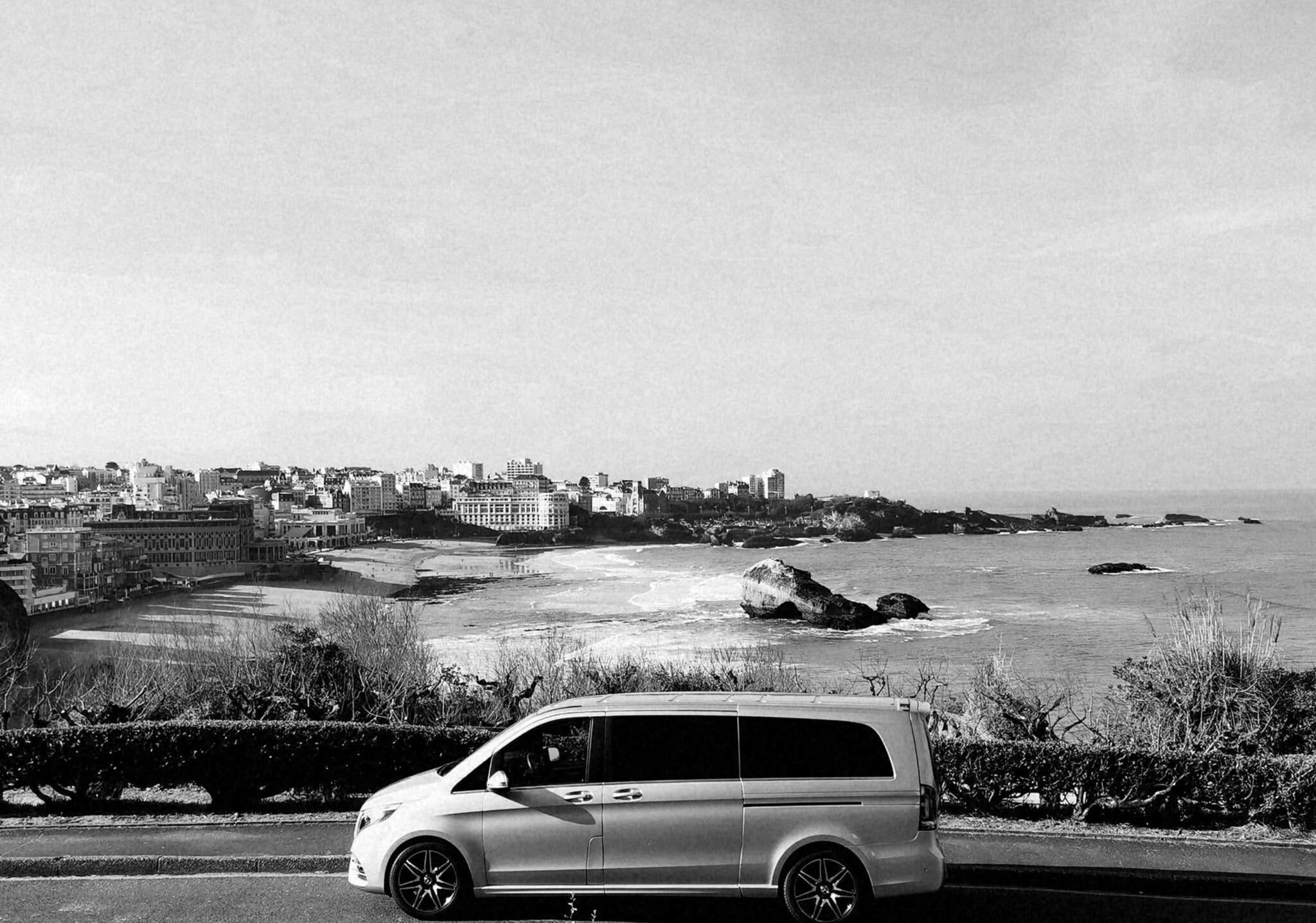Chauffeur driven car on its way to Biarritz overlooking the coast from the street