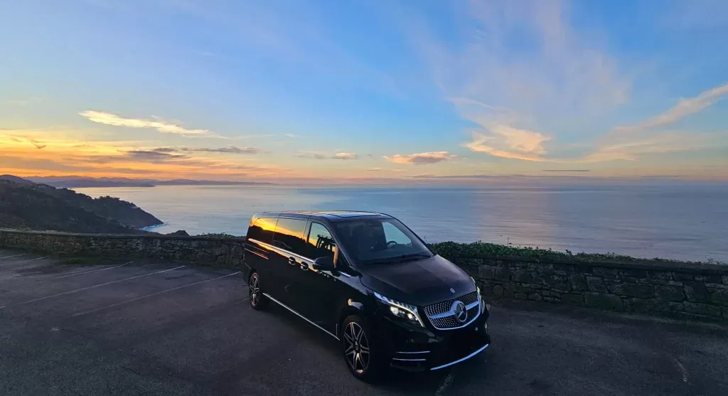 Biarritz luxury chauffeur transfer at sunset
