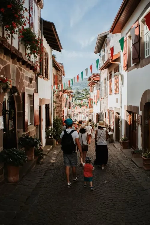 Main street of Saint-Jean-Pied-de-Port bustling with pilgrims and visitors