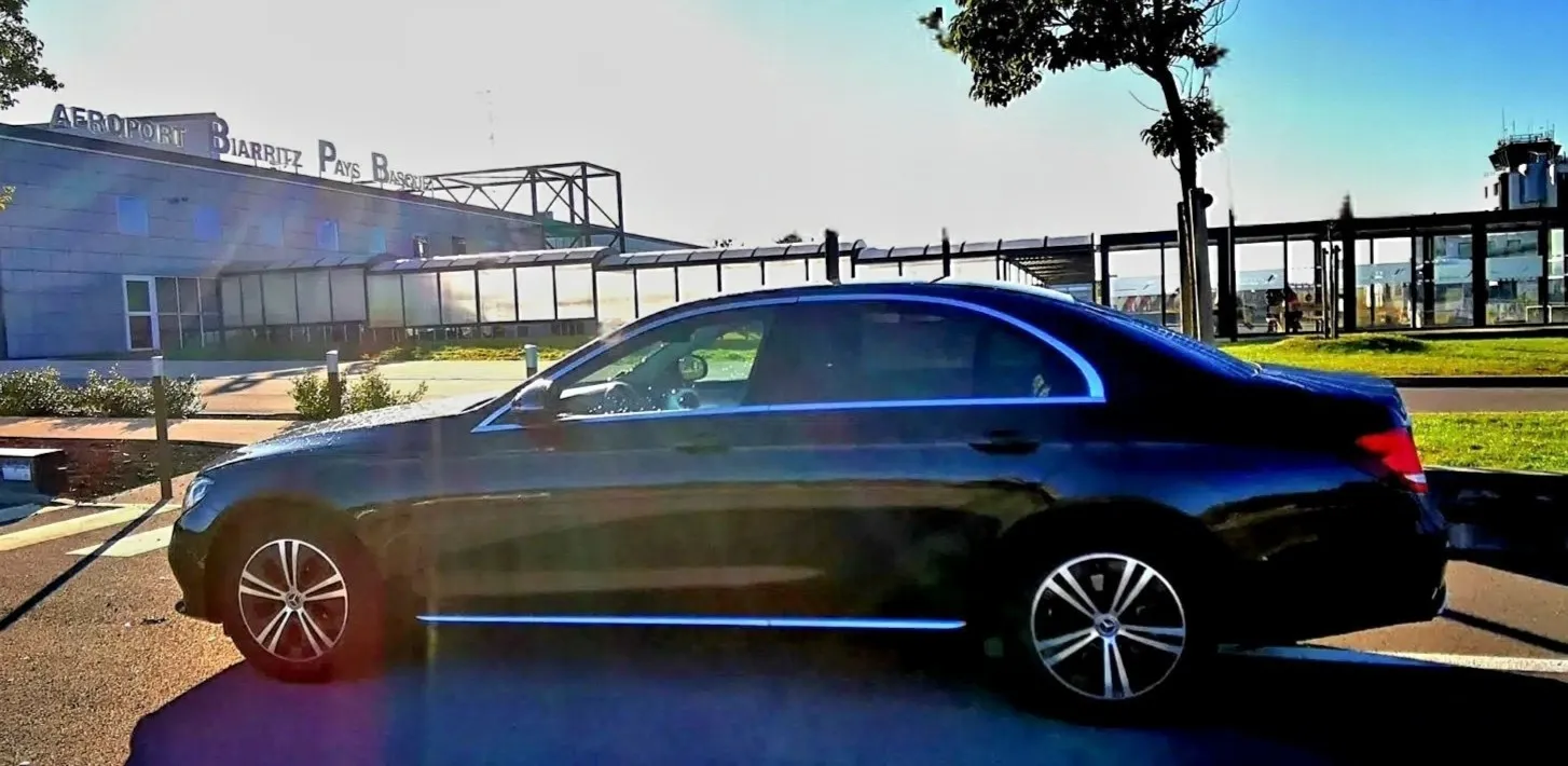 rivate chauffeur at Biarritz Airport with a luxury vehicle
