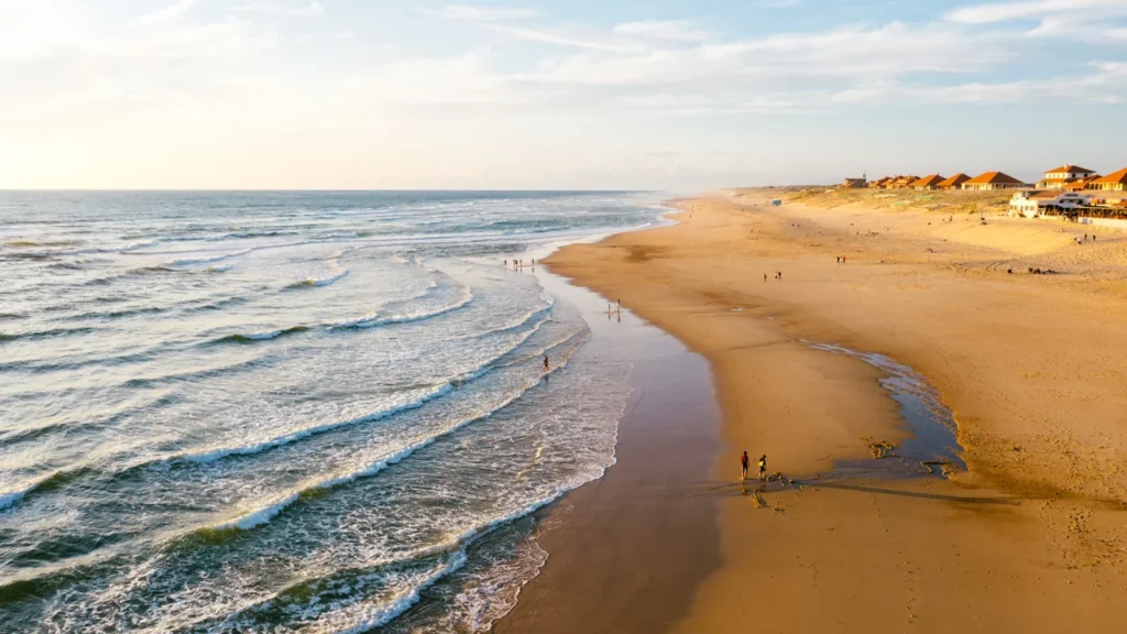 Aerial view of Vieux-Boucau beach at golden hour near Camping Le Vieux Port Messanges Landes